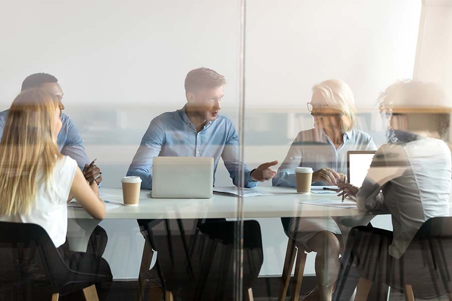 Meeting-an-an-office Team of French-to-English Translators